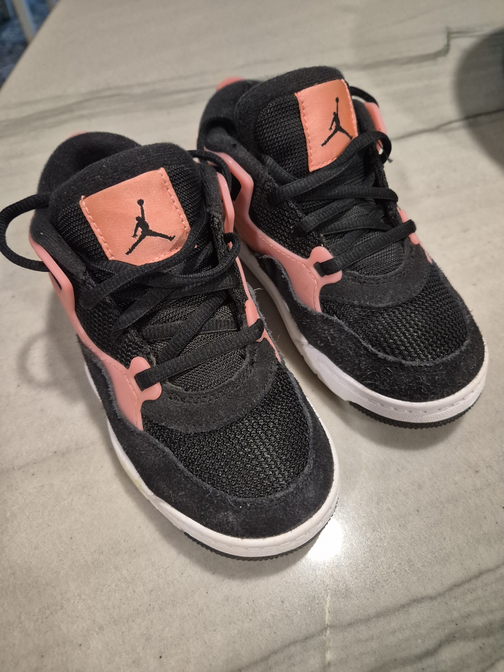 Kids Black and Pink Air Jordan Sneakers